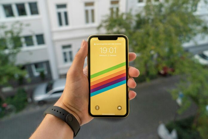 person holding black smartphone